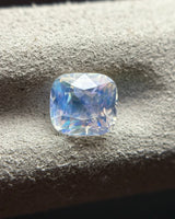 Natural Rainbow Moonstone cushion oblique view highlighting its faceted architecture and visible natural internal character | SARATTI