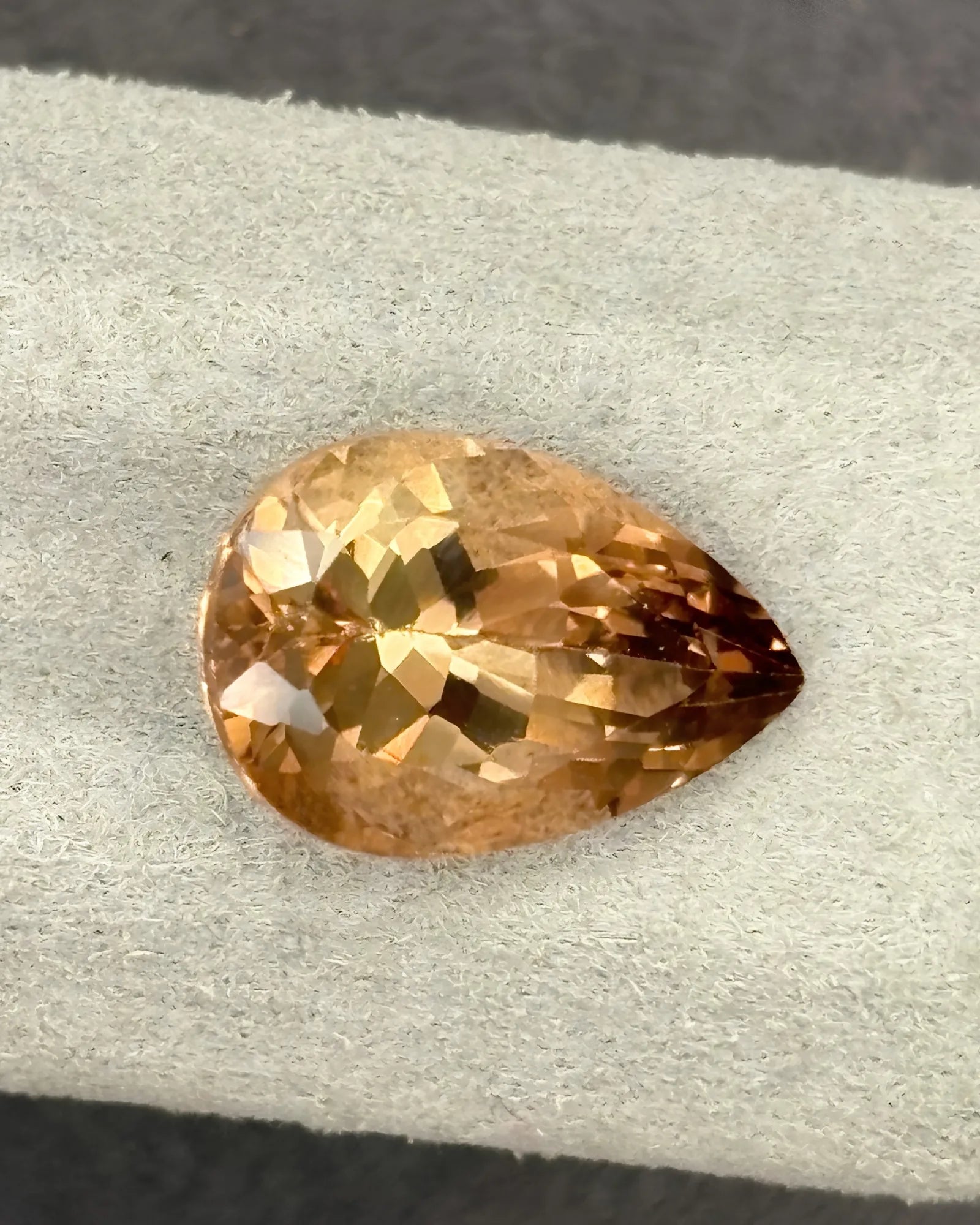 13 × 9mm Natural Imperial Topaz pear-shaped front view | SARATTI