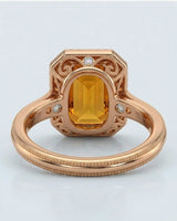 Side view emerald cut Imperial Topaz halo setting in rose gold | SARATTI