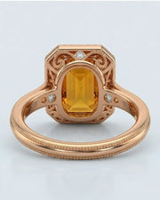 Side view emerald cut Imperial Topaz halo setting in rose gold | SARATTI