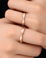 18K rose gold couple wedding rings featuring a continuous Mobius loop symbolising eternal connection | SARATTI