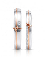 18K two tone gold couple wedding rings featuring contrasting bands and refined romantic craftsmanship | SARATTI