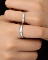 18K white gold diamond wedding set featuring elegant half eternity detailing and coordinated band styling | SARATTI