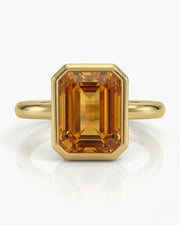 18K yellow gold Imperial Topaz halo setting with orange sapphire accents | SARATTI