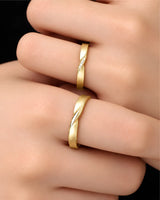18K yellow gold couple wedding rings featuring a continuous Mobius loop symbolising eternal connection | SARATTI