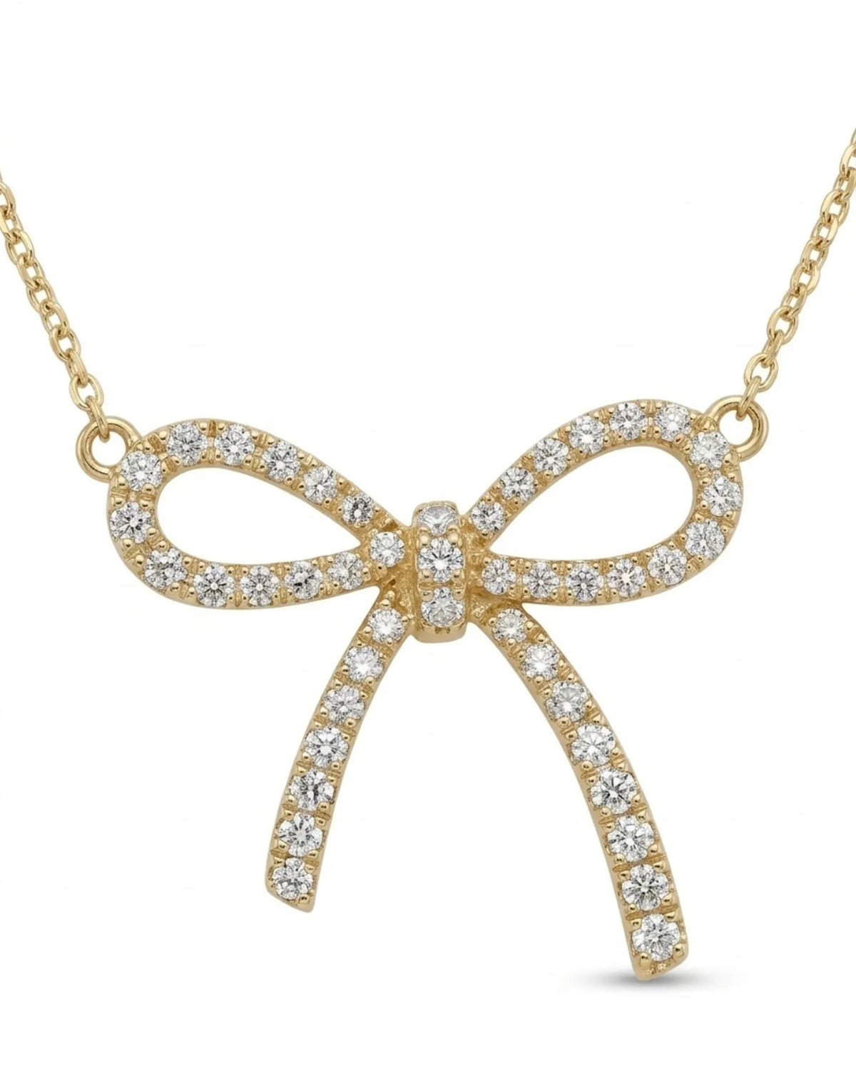 18K yellow gold diamond bow necklace with openwork loops and sparkling centre knot | SARATTI