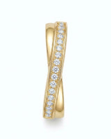 18K yellow gold his and hers wedding rings featuring a classic diamond half eternity design | SARATTI