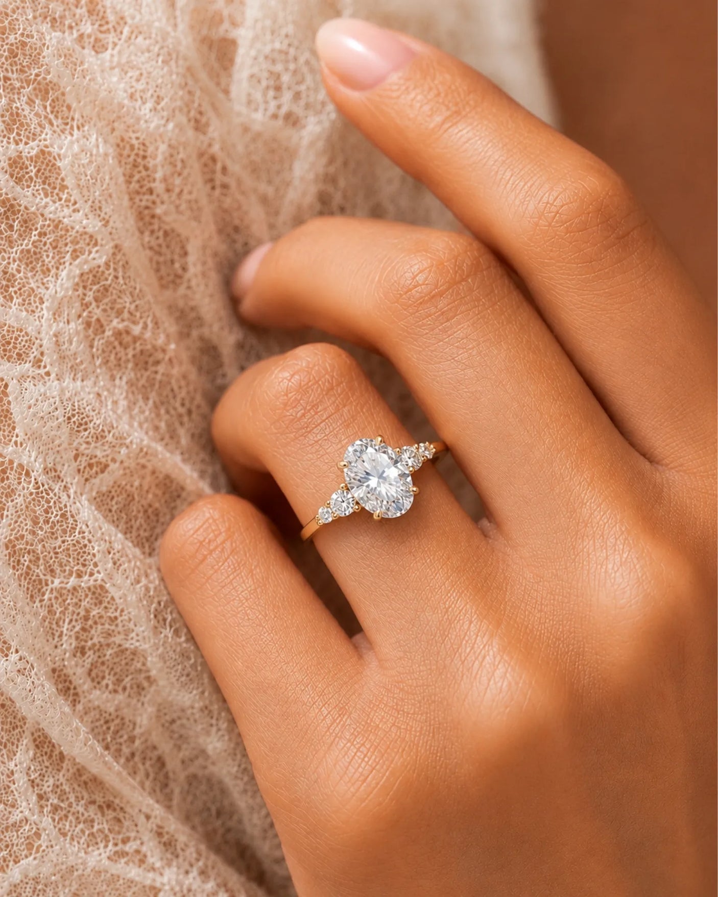 Luxury oval diamond ring with graduated side stones and bespoke 18K rose gold craftsmanship - SARATTI