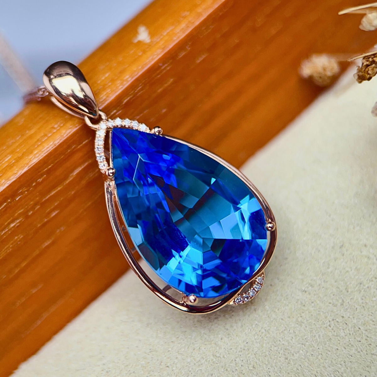 Aqua Solis Swiss Blue Topaz pear pendant in 18K rose gold