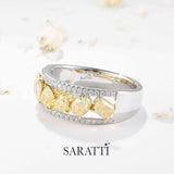 Angled view Platinum Ring with yellow stones on floral background | SARATTI
