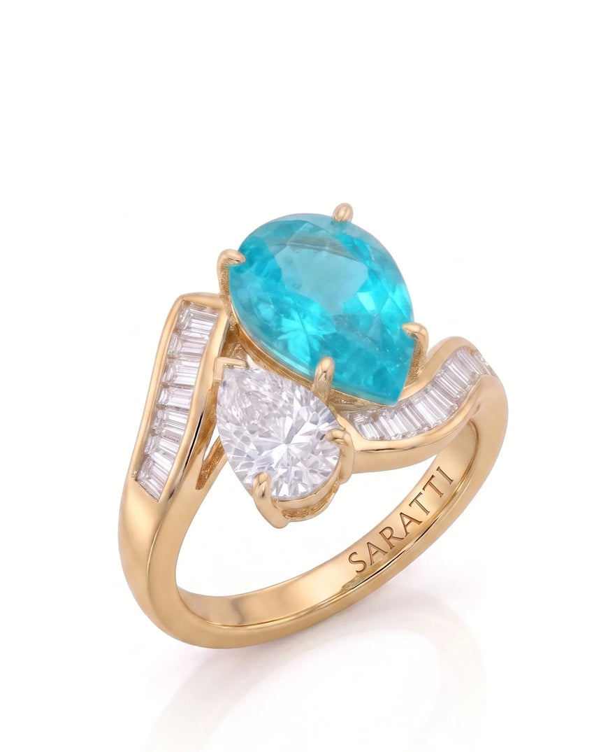 Yellow gold view of Élan Céleste Pear Paraiba Tourmaline and pear diamond Toi et Moi setting | SARATTI