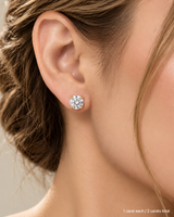 2.00 ct. tw. lab-grown round diamond studs in 18K yellow gold, fair skin on-ear model | SARATTI