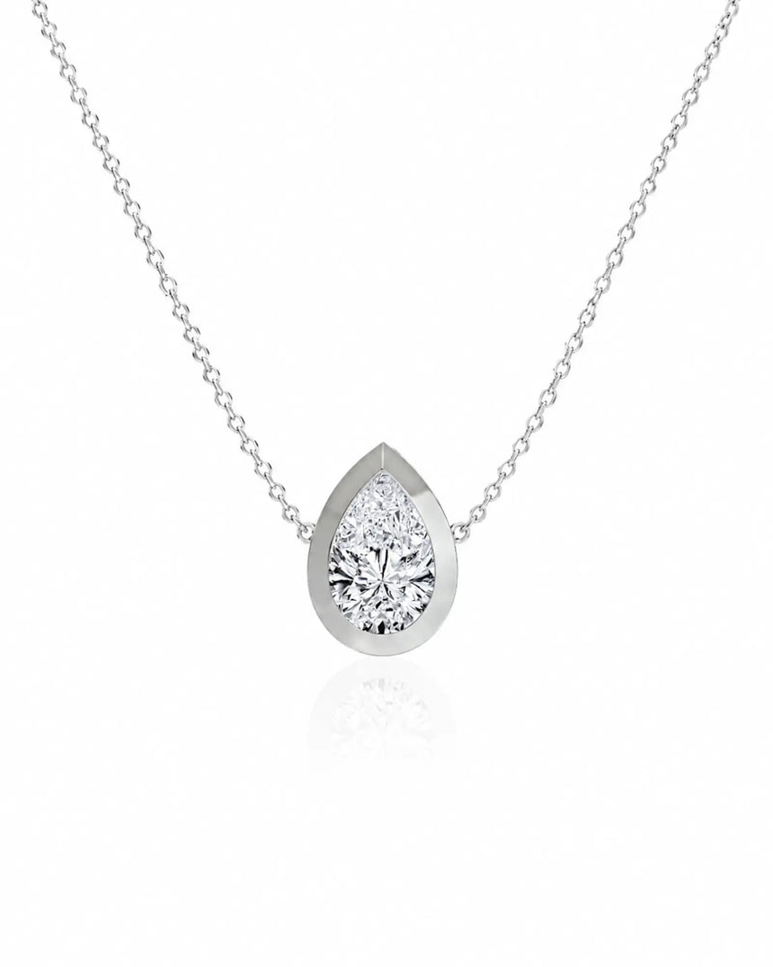 SOLARA Bezel-Set Pear Cut solitaire necklace setting in white gold, front view | SARATTI