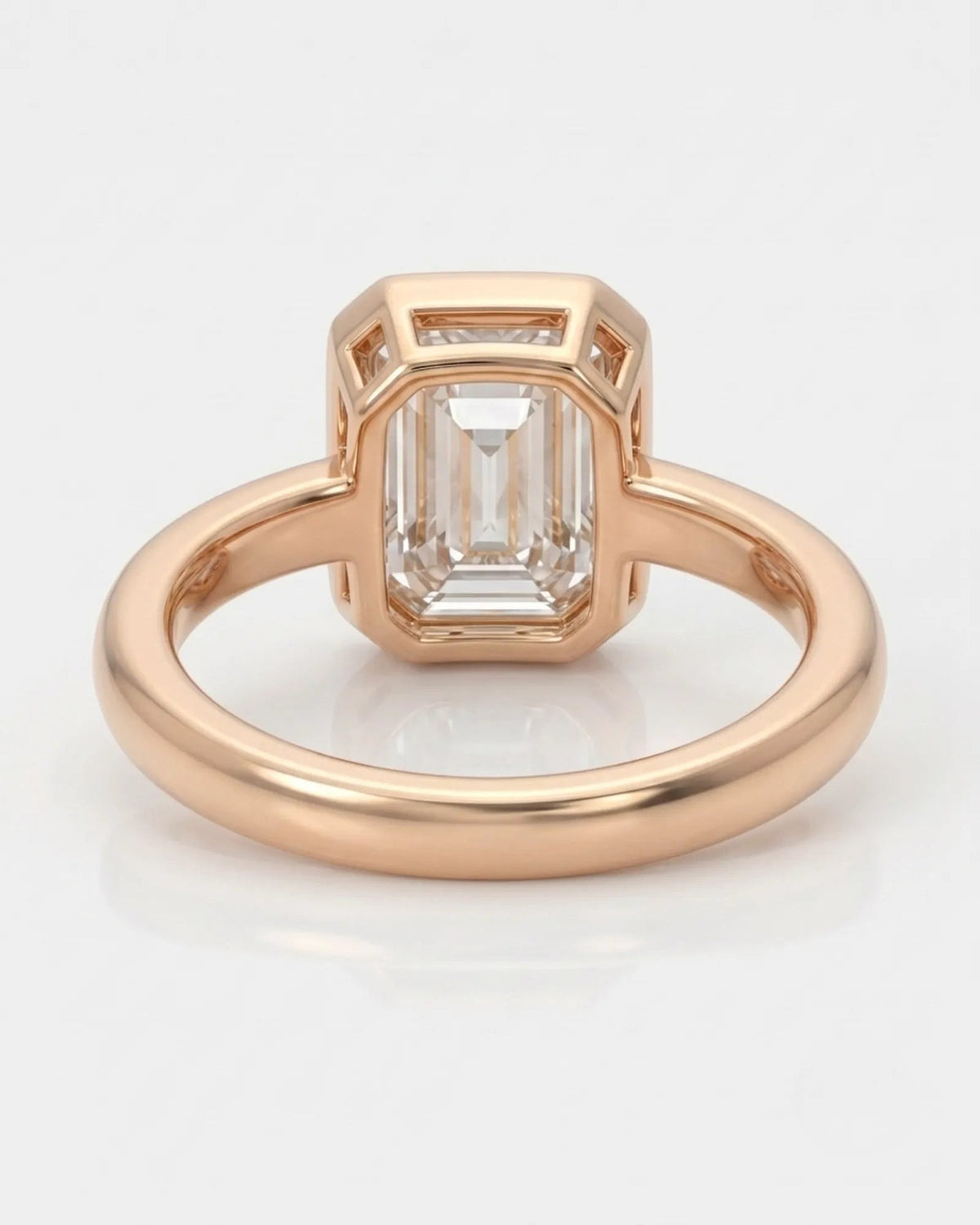 2 carat emerald-cut diamond bezel engagement ring in rose gold, open gallery | SARATTI