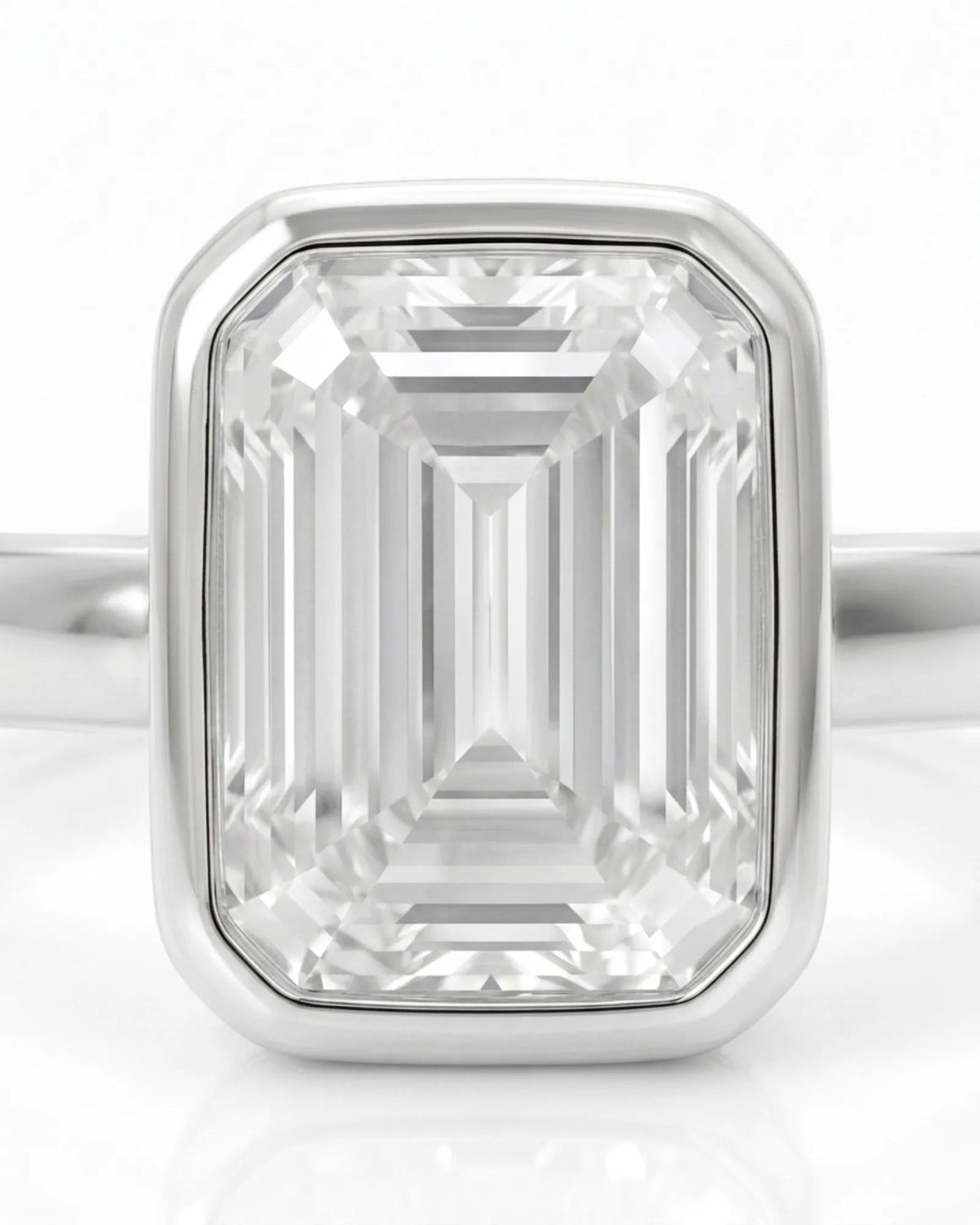 2 carat emerald-cut diamond bezel engagement ring in white gold, bezel detail | SARATTI