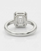 2 carat emerald-cut diamond bezel engagement ring in white gold, open gallery | SARATTI