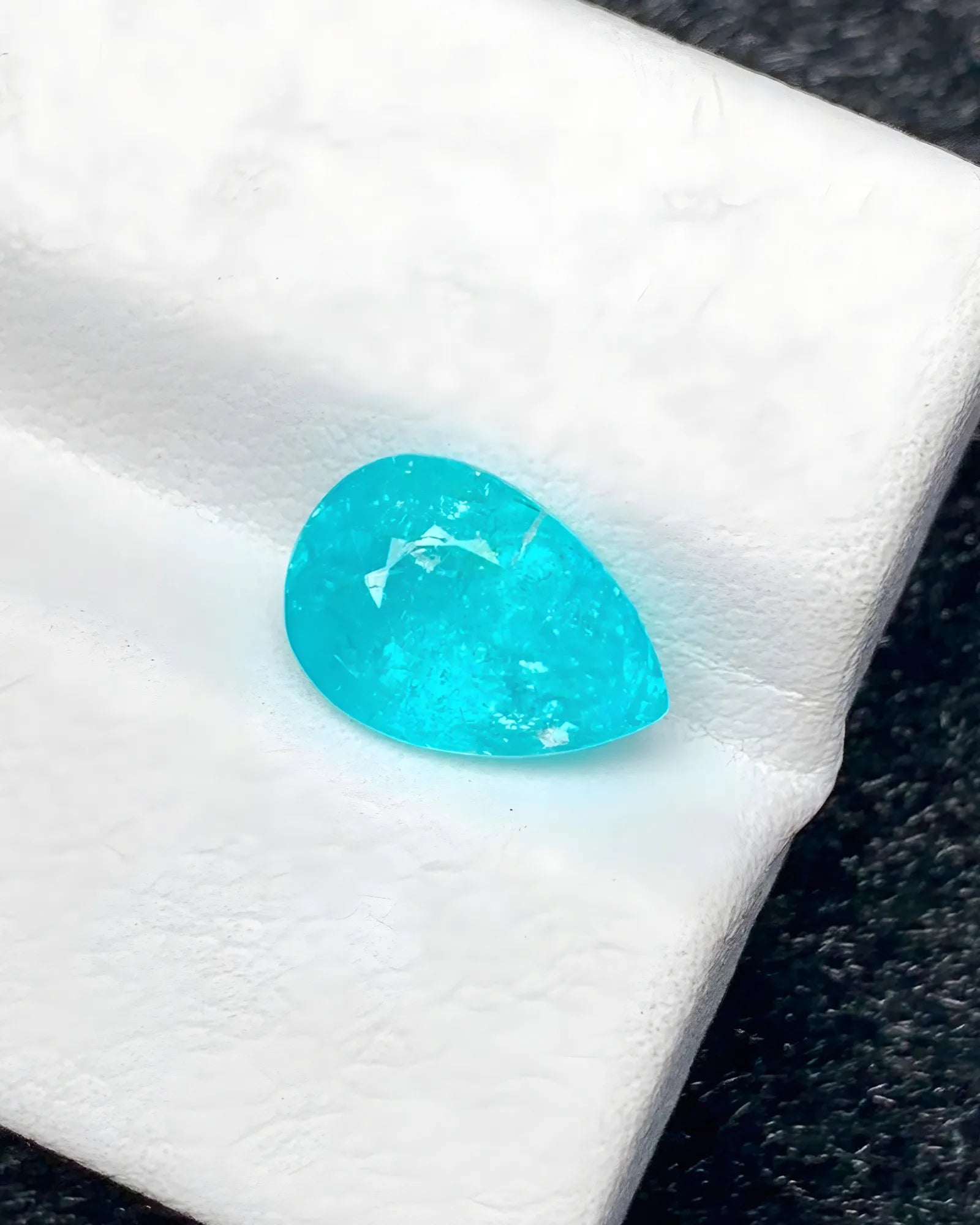 2.41 carat pear cut Paraiba tourmaline close-up - SARATTI
