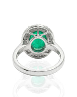 2 carat natural emerald oval halo ring in platinum | SARATTI