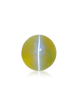3.06 carat natural Honey Color Cat's-Eye Chrysoberyl round cabochon held between fingertips with a bright vertical chatoyant band