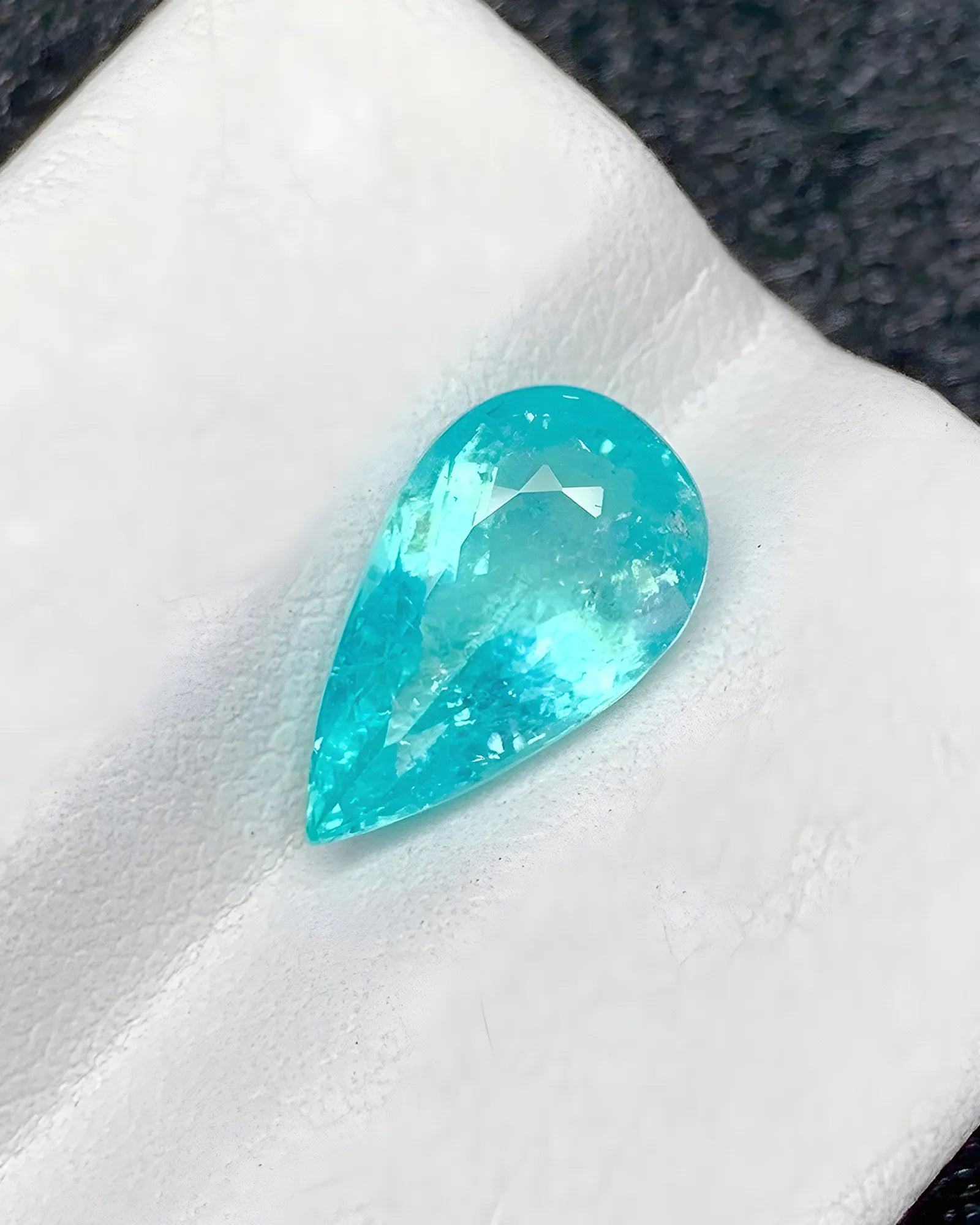 3.19 carat pear cut Paraiba tourmaline close-up - SARATTI
