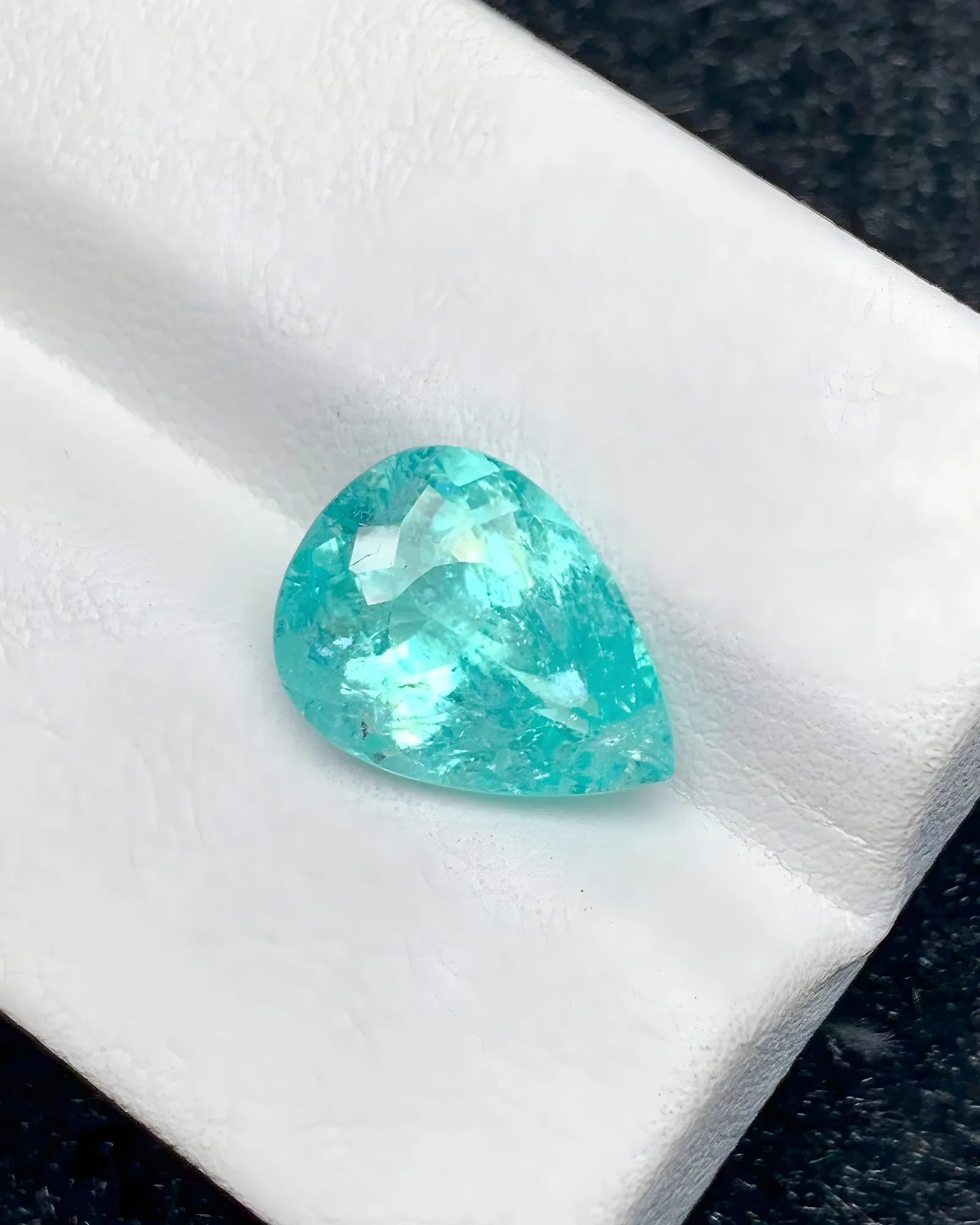 3.80 carat pear Paraiba tourmaline close-up - SARATTI
