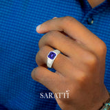 Mens tanzanite ring worn on hand in 18K white gold | SARATTI