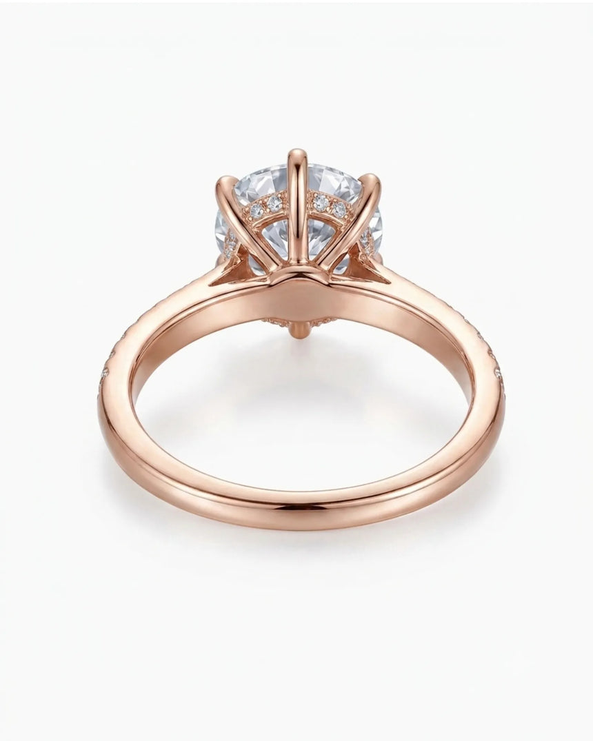 3 carat moissanite six-prong ring with side stones in 18K rose gold | SARATTI