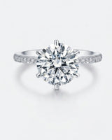 3 carat moissanite six-prong ring with side stones in 18K white gold | SARATTI