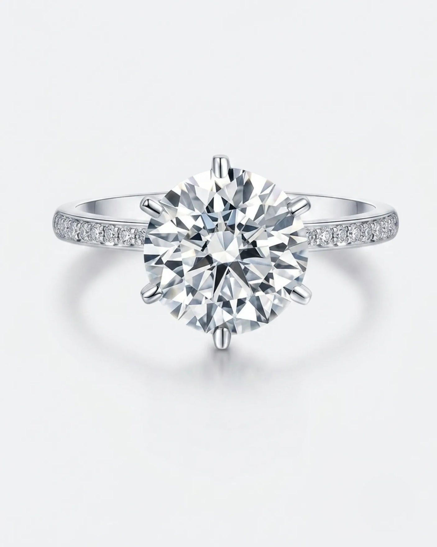 3 carat moissanite six-prong ring with side stones in platinum | SARATTI
