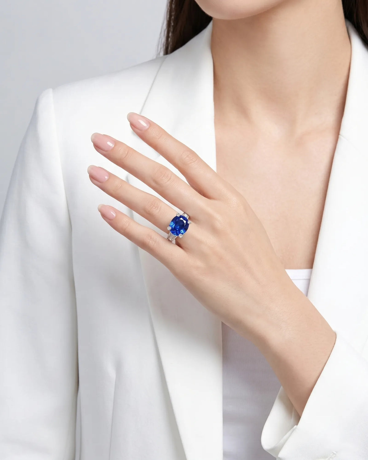 4.14ct oval sapphire diamond pavé ring with raised four-prong setting in polished platinum - SARATTI