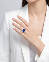 4.14ct oval sapphire diamond pavé ring with raised four-prong setting in polished platinum - SARATTI