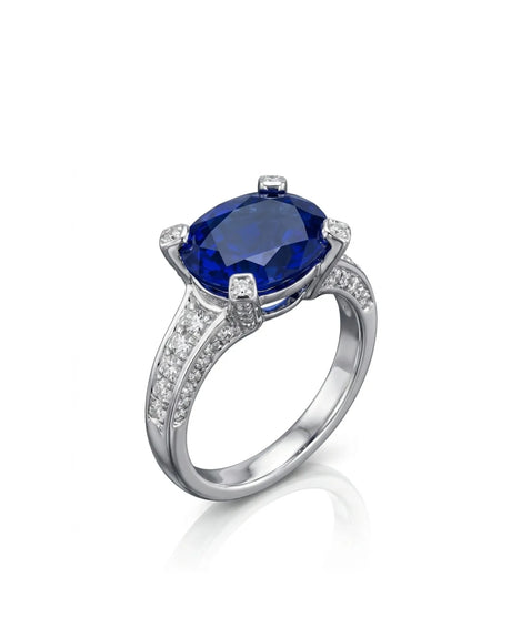 4.14ct oval sapphire diamond pavé ring with raised four-prong setting in polished platinum | SARATTI