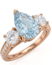 Étoile Trinity pear cut Aquamarine three-stone diamond ring setting in Rose Gold, front view | SARATTI