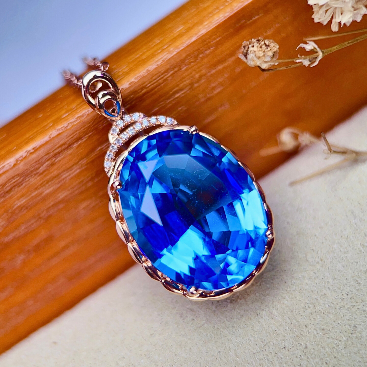 December Birthstone Blue Topaz Oval Pendant in Rose Gold