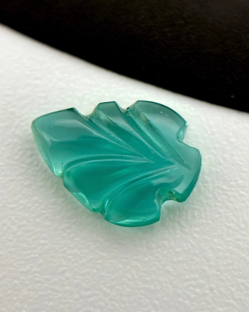 Back view of 0.69ct Natural Emerald carved leaf gemstone | SARATTI