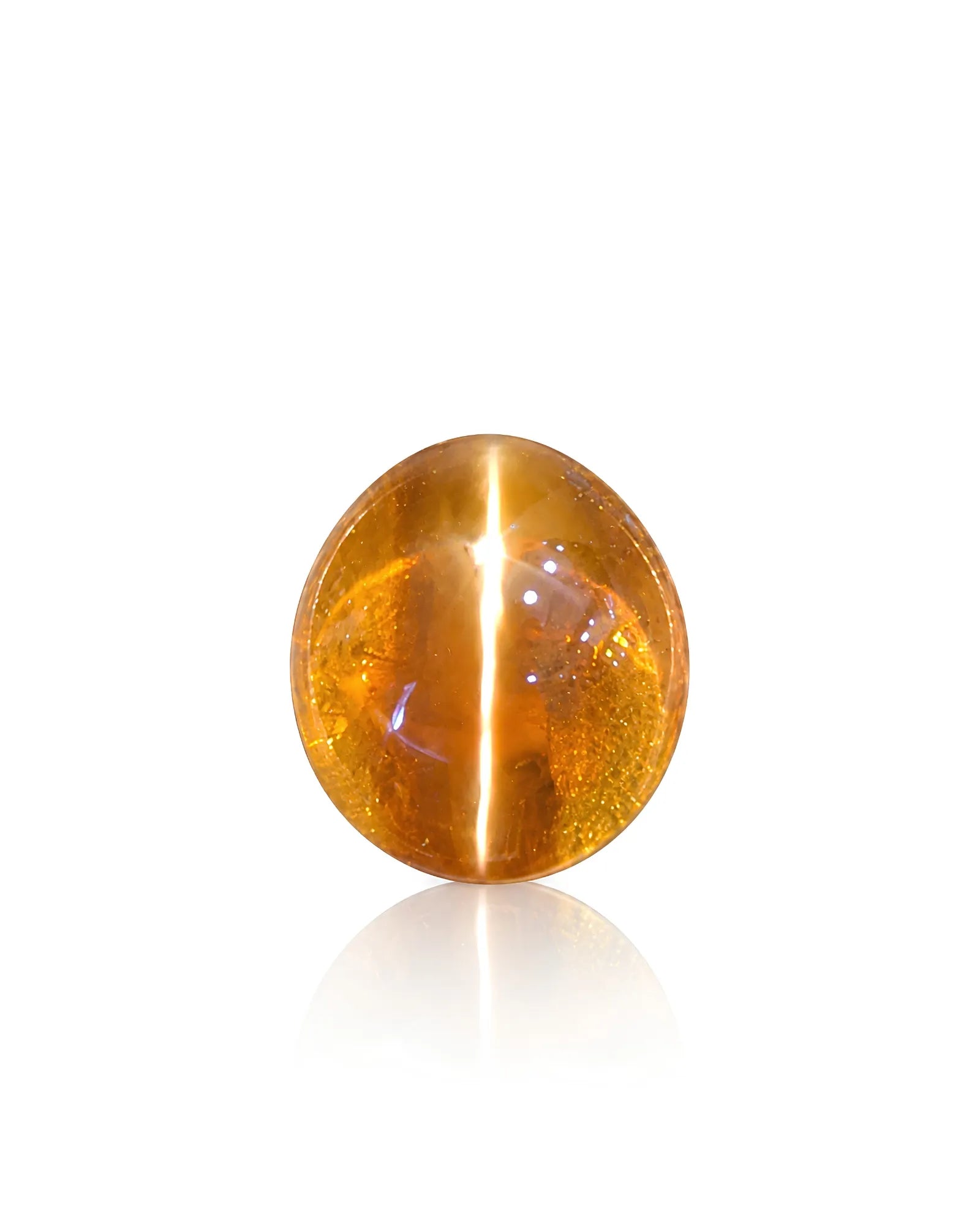 5.00 carat natural Brown Cat's-Eye Chrysoberyl oval cabochon held in tweezers with a bright chatoyant band under directional light