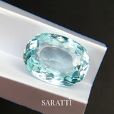 5.05 carat neon light blue tourmaline oval cut faceted loose gemstone macro | SARATTI