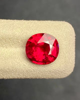 Angled view of 5.24ct Natural Rubellite Tourmaline showing oval proportions and bright facets | SARATTI