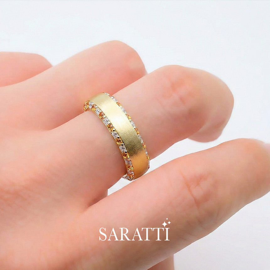 Mens sapphire wedding band worn on hand in 18K yellow gold | SARATTI