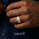 Emerald cut diamond wedding band worn on hand in 18K rose gold | SARATTI
