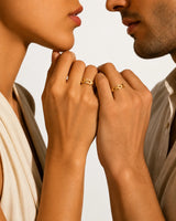 18K yellow gold wedding ring featuring interlocking geometric links and brilliant diamond accents | SARATTI