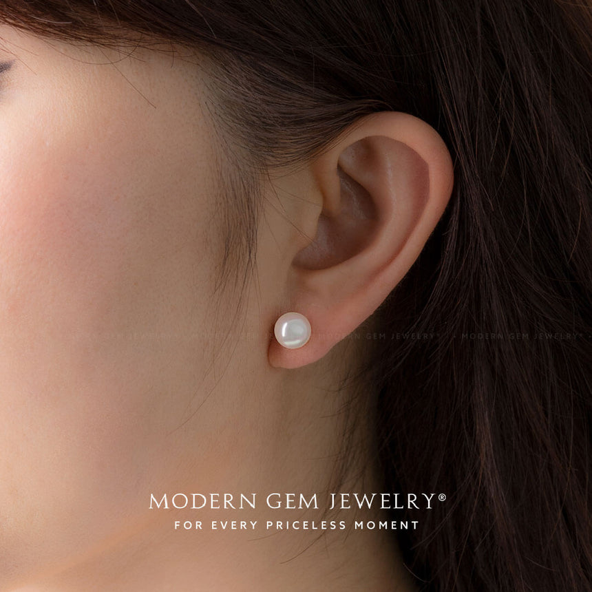 Model wears 18K white gold akoya pearl stud earrings 