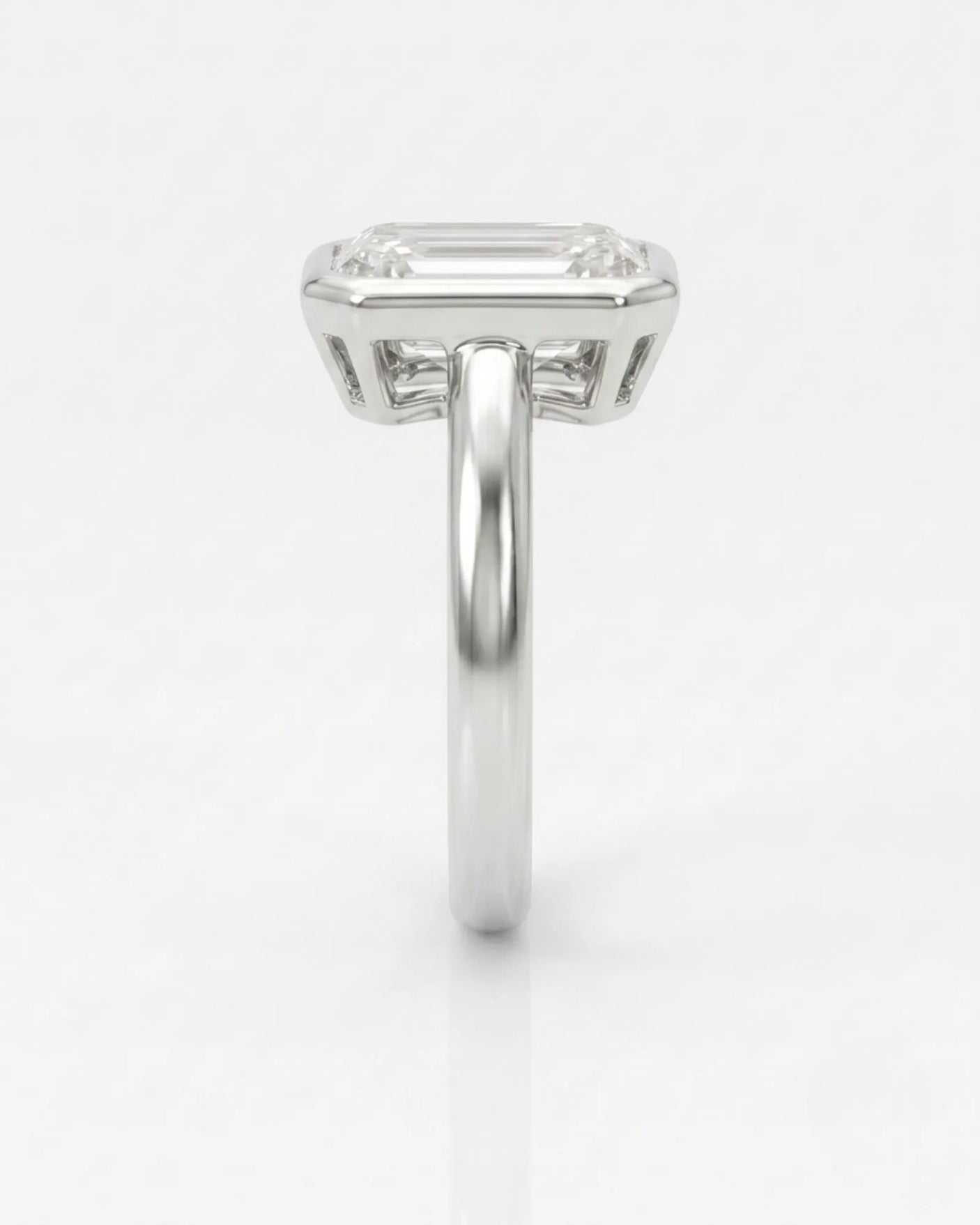 Golden Horizon – Natural Emerald-Cut Diamond Bezel Engagement Ring