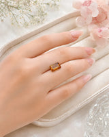 Actual stone image on model hand 14 × 8mm Natural Imperial Topaz alternate angle | SARATTI