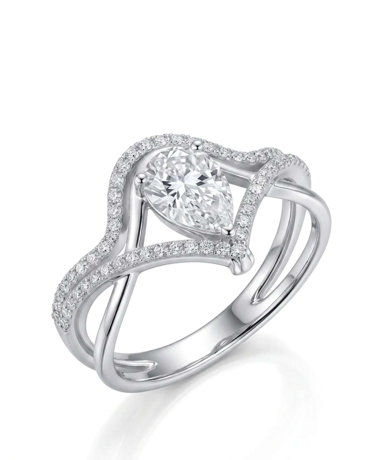 Amara pear-cut moissanite bridal set with V-shaped bands and round accents crafted in platinum | SARATTI