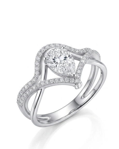 Amara pear-cut moissanite bridal set with V-shaped bands and round accents crafted in platinum | SARATTI