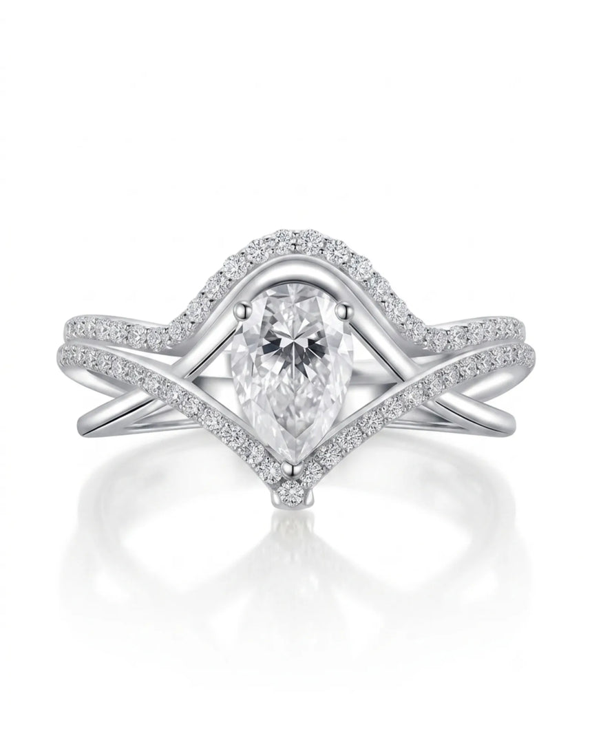 Amara pear-cut moissanite bridal set with V-shaped bands and round accents in 18K white gold | SARATTI