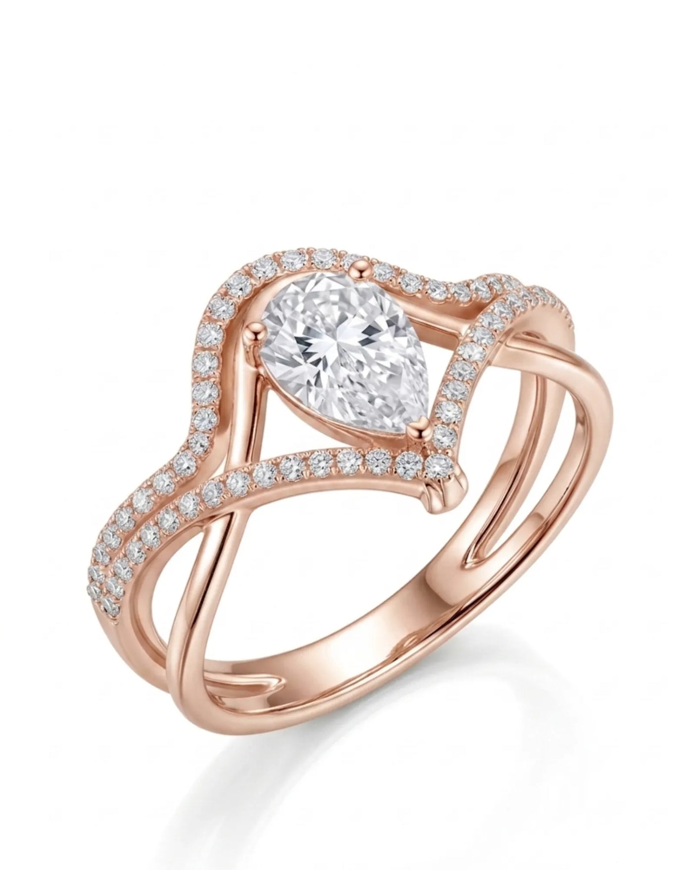 Amara pear-cut moissanite bridal set with layered V-shaped bands in polished 18K rose gold | SARATTI