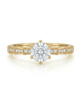 Amora Échelle d’Amour diamond engagement ring worn on hand in 18K yellow gold | SARATTI