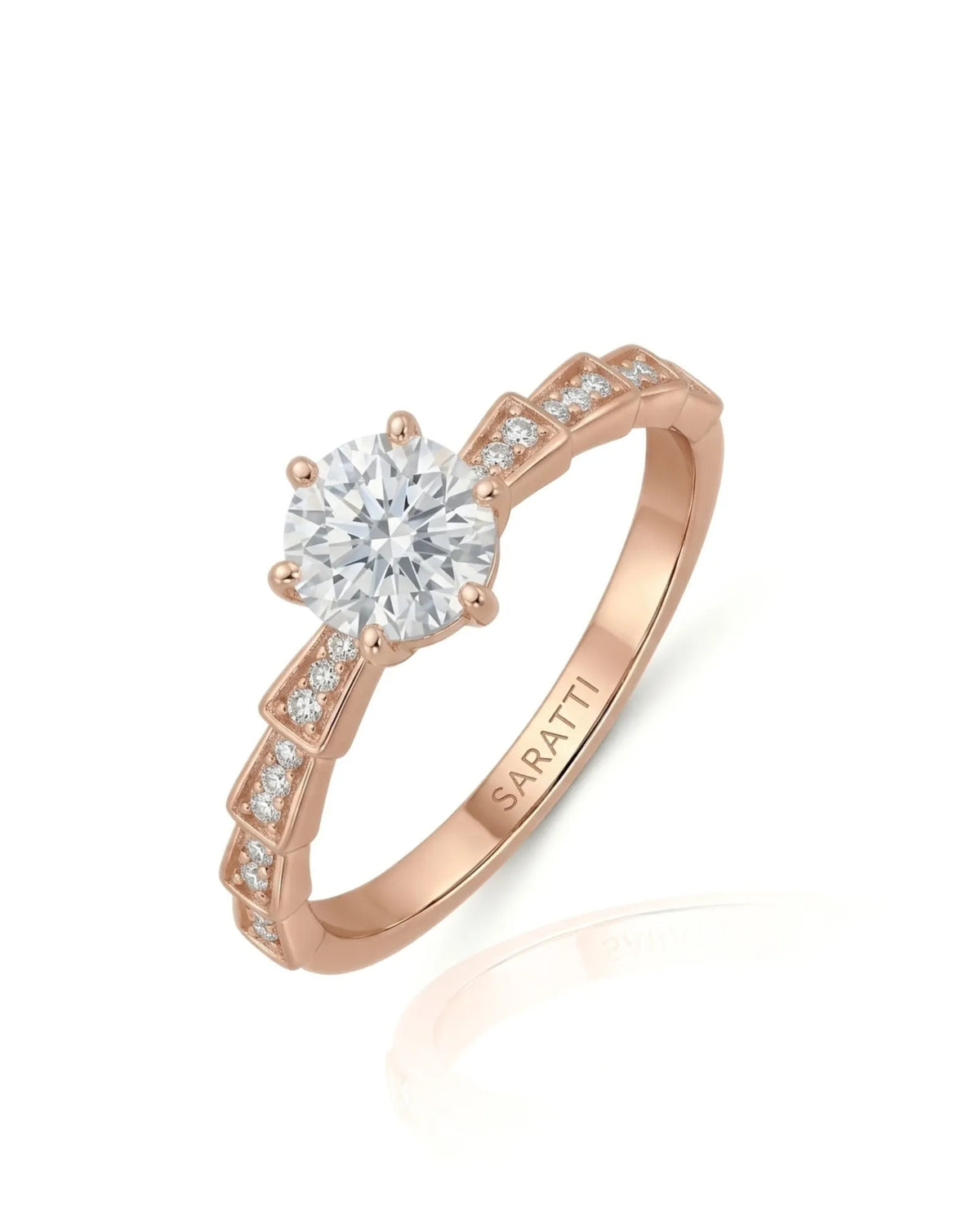 Amora Échelle d’Amour round diamond engagement ring 45-degree view with stepped diamond-set shoulders in 18K rose gold | SARATTI